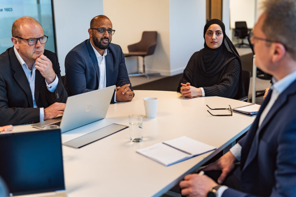 InfraTech Systems consultants in a client meeting at the Leeds office